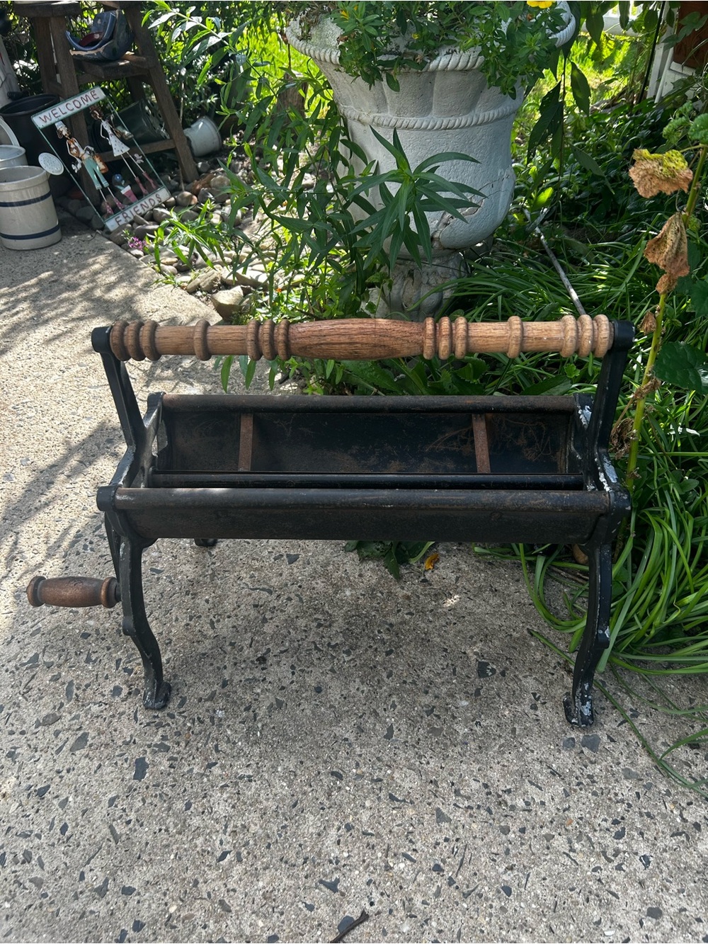 Vintage Cast Iron Newspaper Log Roller